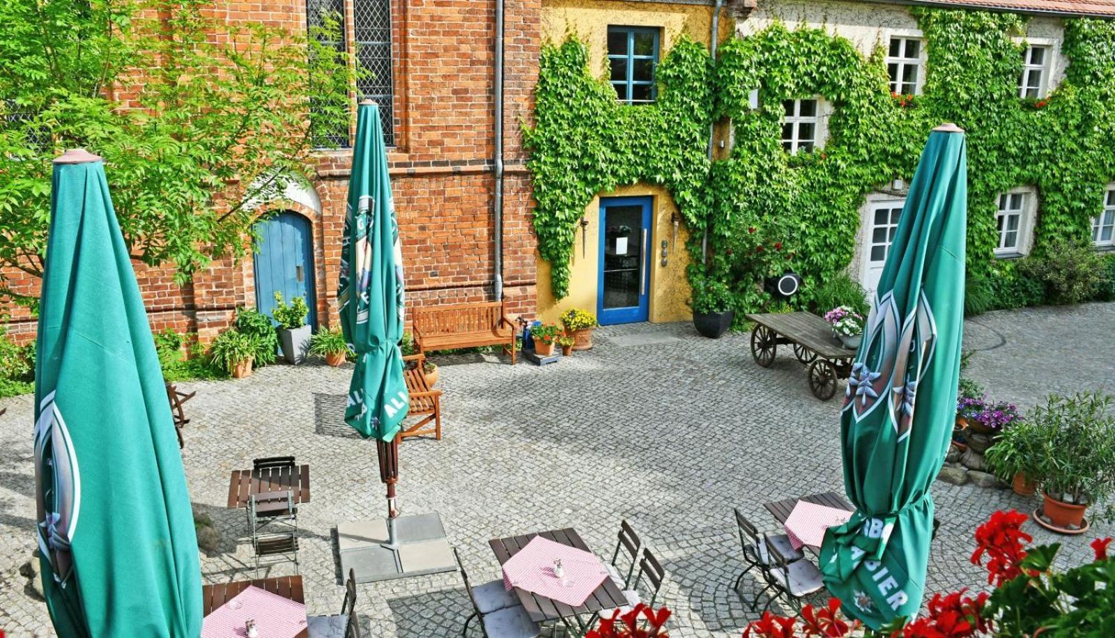 Up Hus Hotel Neuruppin Buitenkant foto