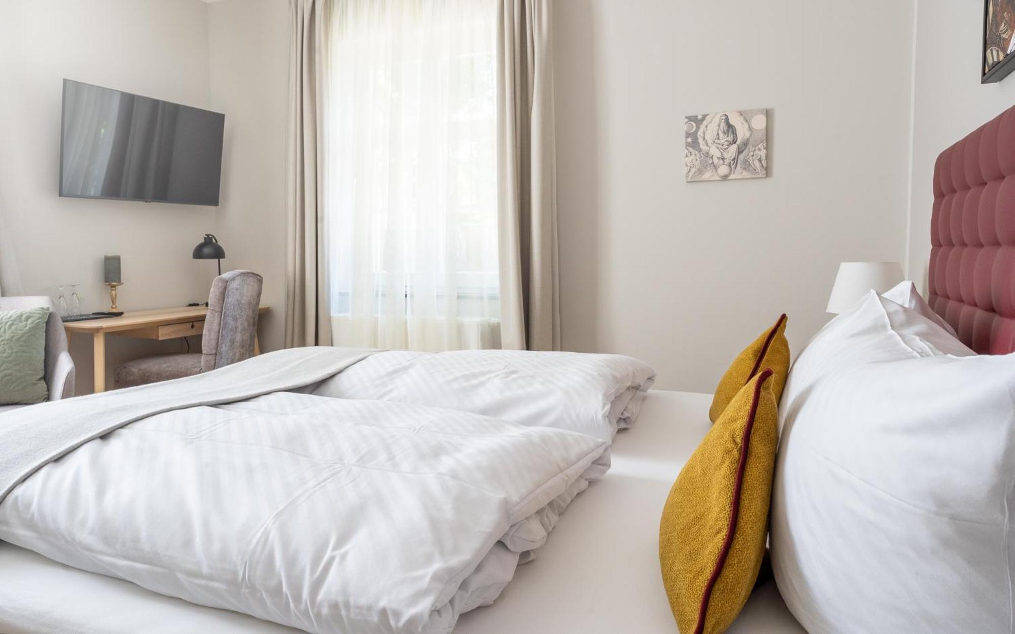 Up Hus Hotel Neuruppin Buitenkant foto